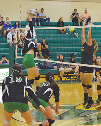 Fayetteville’s Lexi Estes hammers down a spike in the Sept. 19 match against Clermont Northeastern.