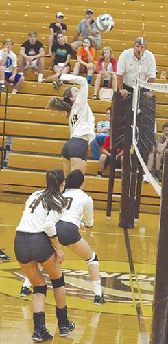 Western Brown’s Rylie Young goes up for a spike in a Lady Broncos’ league win this season.