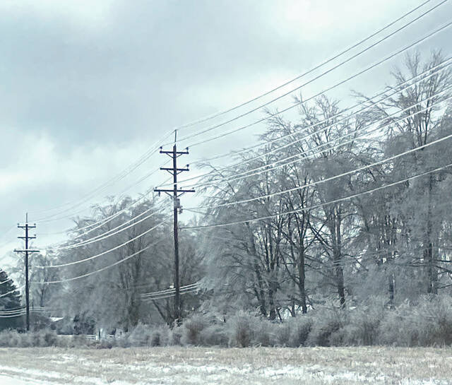 128184414_web1_winter-storm-3
Ice collecting on power lines and tree limbs led to power outages throughout Brown County during last weeks winter storm. Photo by Wade Linville
Ice collecting on power lines and tree limbs led to power outages throughout Brown County during last weeks winter storm. Photo by Wade Linville