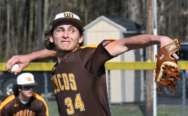 129533864_web1_WBpitcher2
Western Brown High School junior pitcher Ben Crall throws against Goshen at Goshen High School. Crall threw a no-hitter.