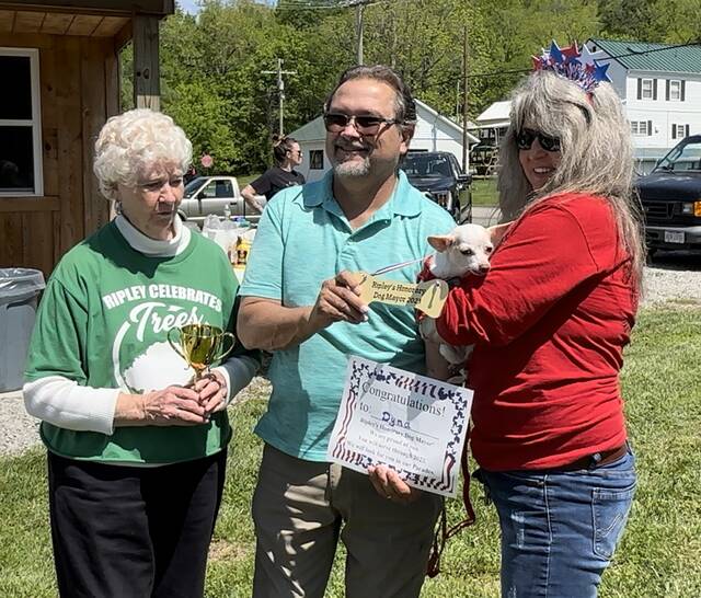 129625920_web1_dog-mayor
Ripleys first annual Honorary Dog Mayor, Dyna, owned by Lisa Grierson. From the left, Carol Stivers of the Ripley Tree Committee, Village of Ripley Council President Charles Poole, and Lisa Grierson holding Dyna the dog mayor. Photo by Wade Linville