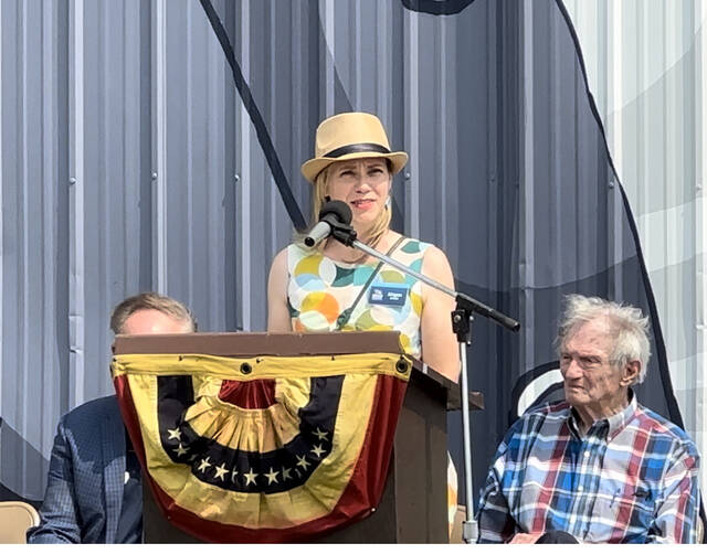 Megan Wood, executive director and CEO of Ohio History Connection, speaks to the crowd during the July 17 U.S. Grant barn painting dedication ceremony held on State Route 125 outside of Georgetown. Photo by Wade Linville