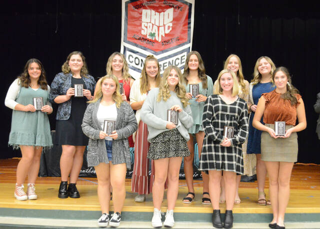 130145060_web1_American-Tennis
The 2023 Southern Buckeye Athletic/Academic Conference American Division First Team for girls tennis pose with their awards during the Nov. 8 awards banquet at Hamersville School. Front row, from the left, Bailey Wheeler (Wilmington), Layna Holmes (Wilmington), Cary Holliday (Wilmington), and Payton Ollendick (New Richmond); back row, Emily Redmond (New Richmond), Mikayla Wonderly (Clinton-Massie), Addison Swope (Clinton-Massie), Marla Jones (Clinton-Massie), Brylie Green (Clinton-Massie), Noel Gasaway (Clinton-Massie) and Elle Dunham (Clinton-Massie). Photo by Wade Linville