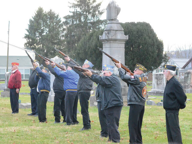 130250575_web1_21-gun-salute
The Wreaths Across America Day ceremony held at Ripleys Maplewood Cemetery on Dec. 16 concluded with a 21-gun salute and the playing of Taps. Photo by Wade Linville