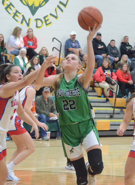 130316501_web1_christina-murphy
Fayetteville-Perry freshman Christina Murphy goes up for a score during a game this season. Photo by Wade Linville