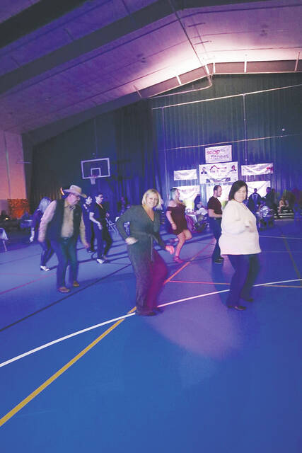 130356134_web1_Mt.-orab-park-fundraiser
The Night Before New Years Eve Party held at the Mt. Orab Sports Complex on Dec. 30 was one of the fundraisers held for the Mt. Orab Community Playground. Photo provided
