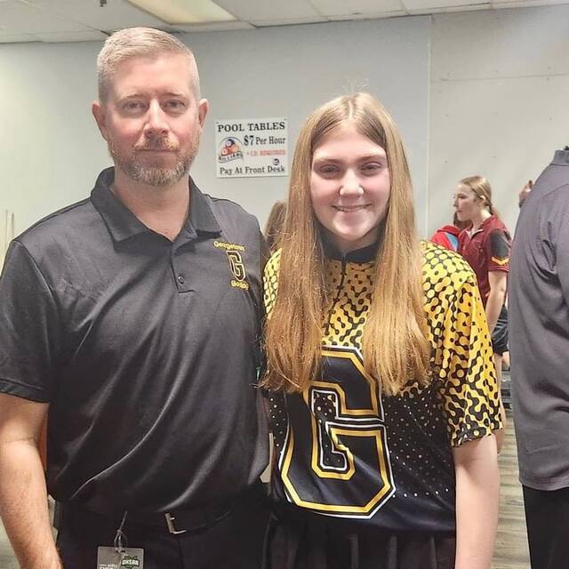 130431915_web1_IMG_0826
Georgetown High Schools sophomore bowling standout, Carolyn Edmisten, recently competed in the OHSAA Division II Girls State Bowling Tournament in Columbus. Edmisten (right) has been named the Southern Buckeye Athletic/Academic Conference Girls Bowler of the Year, and Georgetowns Brandon Winterod (left) has been named the SBAAC National Division Girls Bowling Coach of the Year. Photo provided