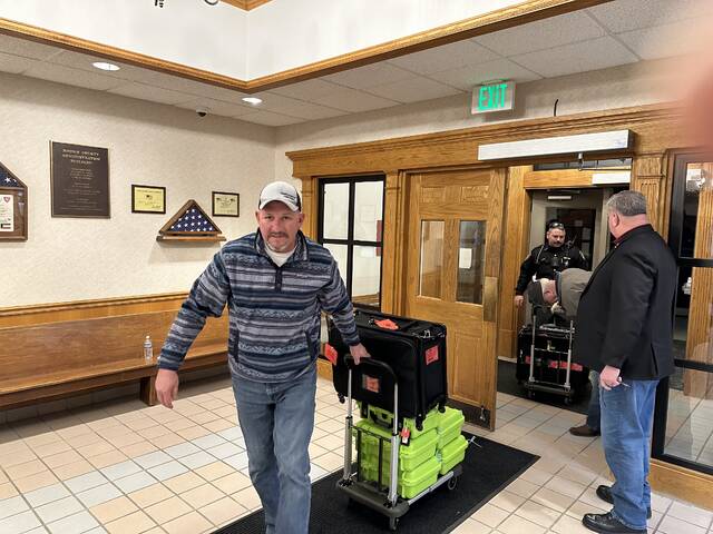 130471757_web1_IMG_0871
Ballots from Brown County voters arrive at the Brown County Board of Elections Office for the March 19 primary. Photo by Wade Linville