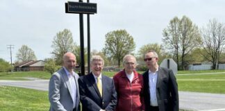 
			
				                                On the sunny afternoon of April 22, school administrators, teachers, and students gathered for the official dedication of Ralph Sininger Way on the Georgetown Exempted Village Schools campus. From the left, Eric Toole (Treasurer), Dr. Raymond Virost (GEVS Board president), Ralph Sininger, and Brad Winterod (GEVS superintendent). Photo Provided
 
			
		
