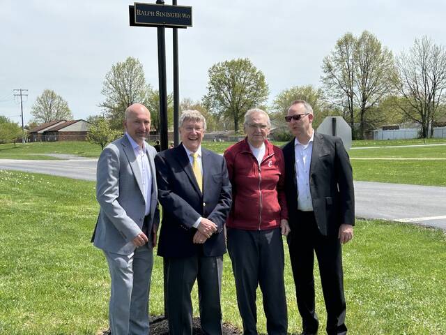 131493227_web1_UTF-8IMG_4696
On the sunny afternoon of April 22, school administrators, teachers, and students gathered for the official dedication of Ralph Sininger Way on the Georgetown Exempted Village Schools campus. From the left, Eric Toole (Treasurer), Dr. Raymond Virost (GEVS Board president), Ralph Sininger, and Brad Winterod (GEVS superintendent). Photo Provided
