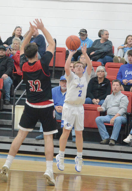 Ripleys Landon Dickhaus launches a shot from three-point range during the Blue Jays Feb. 19 game against Eastern. Photo by Wade Linville